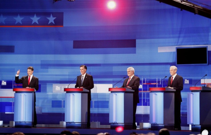 pose before the Republican Party presidential candidates debate in Sioux City, Iowa, December 15, 2011.