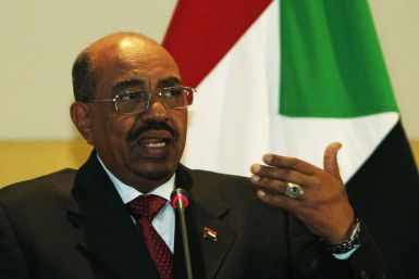 Sudanese President Omar Hassan al-Bashir speaks during a news conference in Tripoli