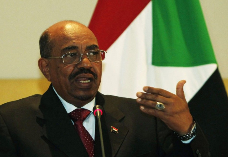 Sudanese President Omar Hassan al-Bashir speaks during a news conference in Tripoli