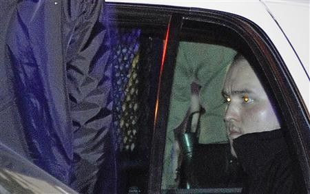 Harry Burkhart, 24, is detained by the Los Angeles county sheriff's department on suspicion of setting dozens of fires across Los Angeles, in this file photo taken in West Hollywood