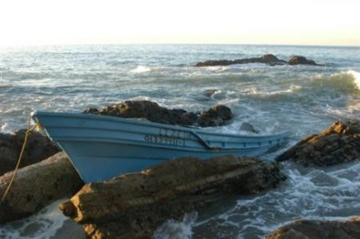 A boat that contained smuggled bales of marijuana is seen washed ashore on a beach in Ventura County, California north of Los Angeles in this handout photograph taken and released to Reuters on January 4, 2012. Police seized a Mexican motorboat loaded wit