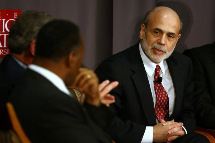 Federal Reserve Chairman Bernanke speaks with CEO of Moody Nolan Inc. Moody during a discussion at The Ohio State University