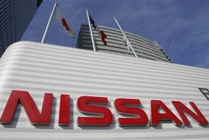 A logo of Nissan is pictured outside the company headquarters building in Yokohama, south of Tokyo