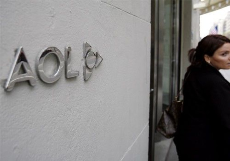 A woman walks out of AOL offices in New York
