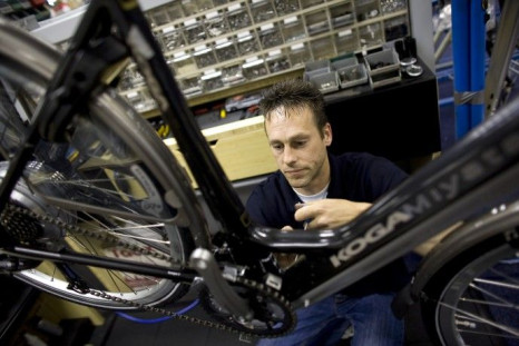 A worker assembles a Koga Miyata bicycle at the company's factory in the Dutch northern town of Heerenveen