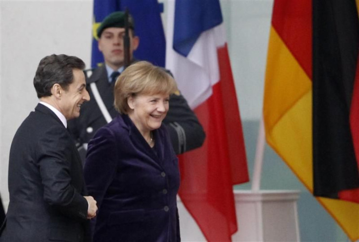 French President Sarkozy arrives to visit German Chancellor Merkel at the Chancellery in Berlin