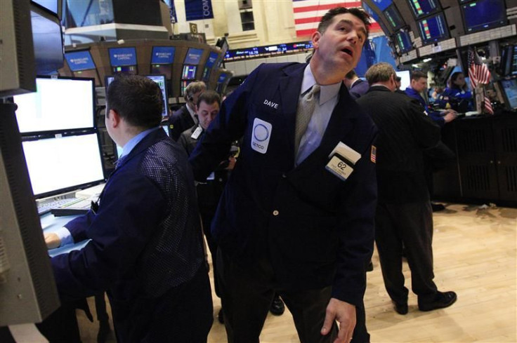 Traders work on the floor of the New York Stock Exchange