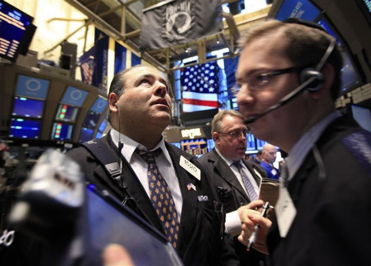 Traders work on the floor of the New York Stock Exchange