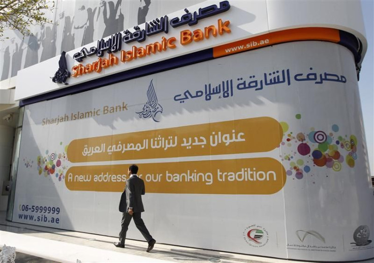 A man walks past a newly-opened Sharjah Islamic Bank branch on Sheikh Zayed road in Dubai