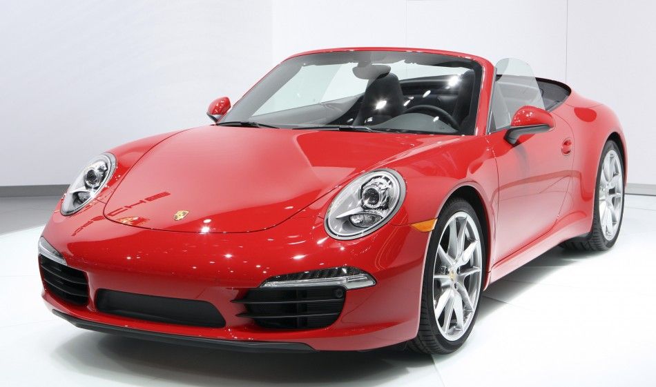 The convertible version of the Porsche 2012 911 Carrera Coupe is displayed during first press preview day for the North American International Auto Show in Detroit, Michigan January 9, 2012.