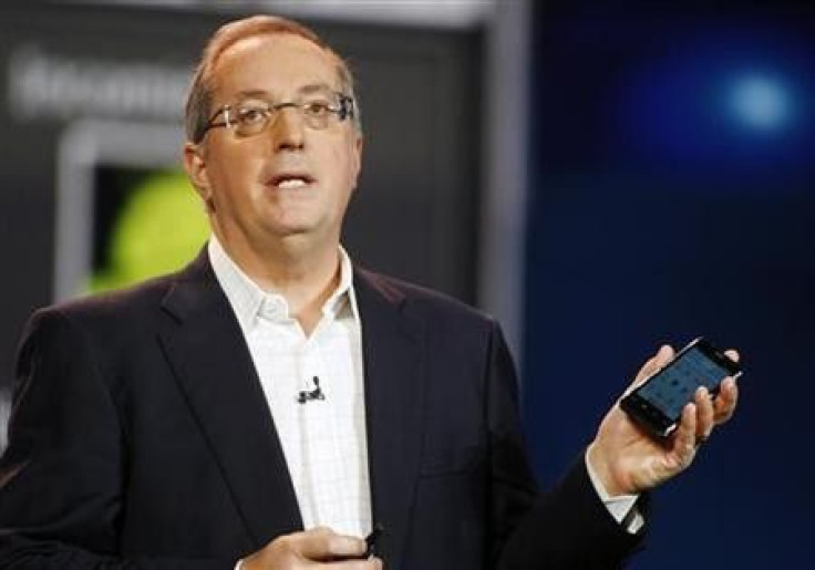 Paul Otellini, president and CEO of Intel Corporation, holds an Intel smartphone reference design as he gives a keynote address during the 2012 International Consumer Electronics Show (CES) in Las Vegas, Nevada, January 10, 2012.