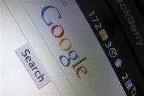 A Google Inc page is shown on a blackberry phone in Encinitas, California April 13, 2010.