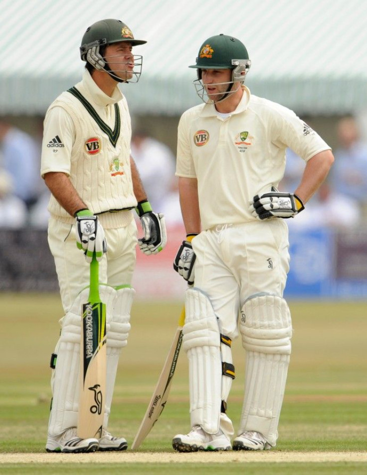 Australia's Ponting and Hughes chat during the third day's play of their cricket match against Sussex at the County Ground in Hove, East Sussex on 26/06/2009.
