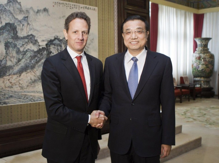 U.S. Treasury Secretary Geithner shakes hands with Chinese Vice Premier Li in Beijing