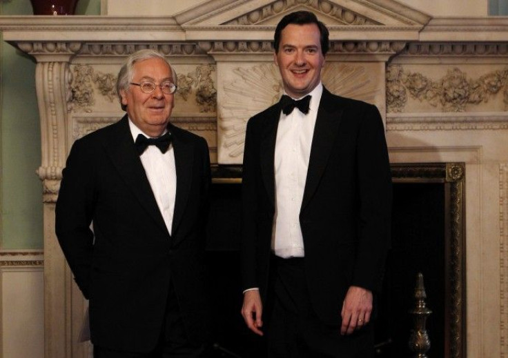 Bank of England Governor King poses with Britain's Chancellor of the Exchequer Osborne at the Lord Mayor's Dinner to the Bankers and Merchants of the City of London