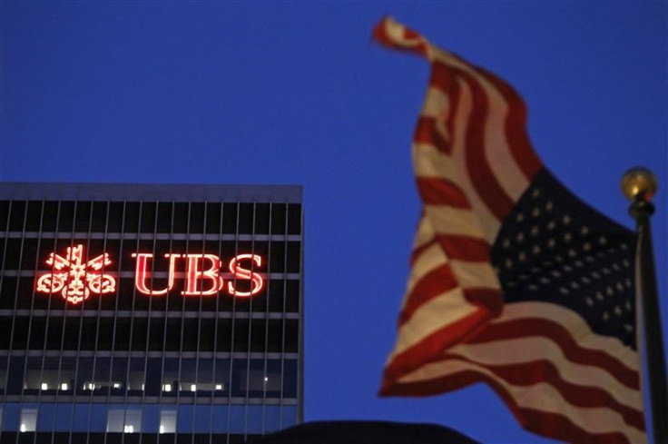 An U.S. flag flies in front of a UBS building in New York