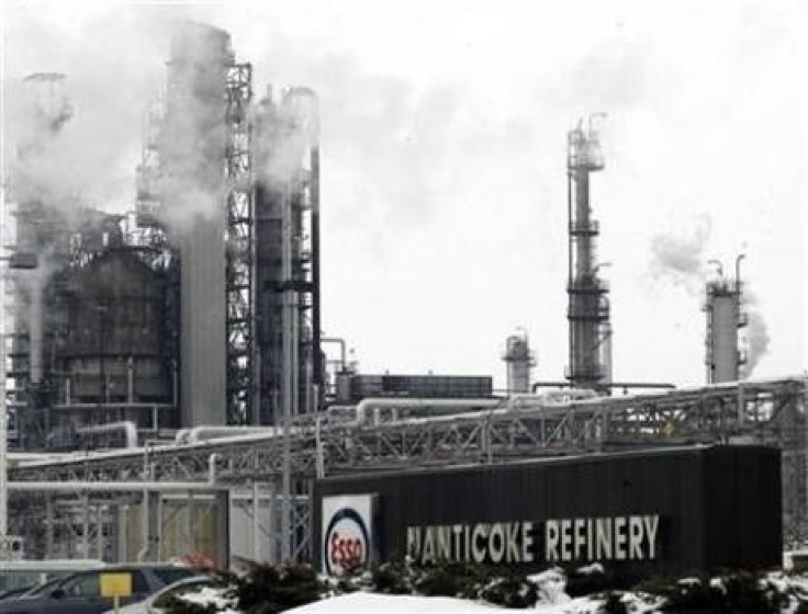 Smoke rises from stacks as processing slowly resumes at the Imperial Oil refinery in Nanticoke