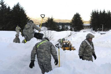 National Guard troops help shovel out snow in Cordova