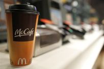 A cup of coffee is seen on a counter at a McDonald&#039;s restaurant in New York
