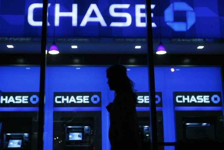 A woman walks past a JP Morgan Chase bank branch in New York