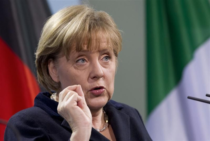 German Chancellor Merkel speaks during news conference after talks with Italian Prime Minister Mario Monti at Chancellery in Berlin