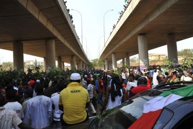 Demonstrators gather during a protest against the elimination of a popular fuel subsidy in Abuja