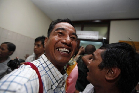 Political prisoner Zaw Thet Htway, released from Taunggyi prison, smiles as he arrives in Yangon domestic airport