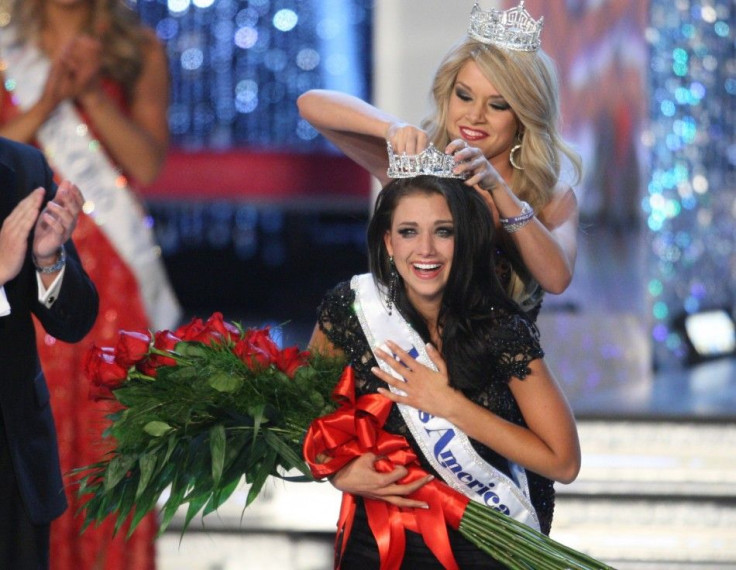 Miss Wisconsin Laura Kaeppeler is crowned by Miss America 2011 Teresa Scanlan after being named Miss America 2012 in Las Vegas