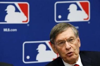Major League Baseball Commissioner Bud Selig speaks at a news conference in New York, November 22, 2011, to announce a new five-year collective bargaining agreement with the players that will allow play to continue uninterrupted through the 2016 season.