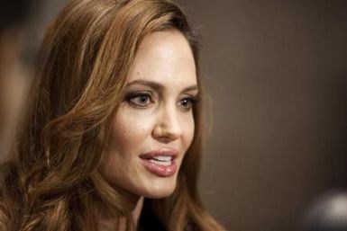 Angelina Jolie speaks during an interview before the premier of &#039;&#039;In the Land of Blood and Honey&#039;&#039;, a movie she wrote and directed, in Washington