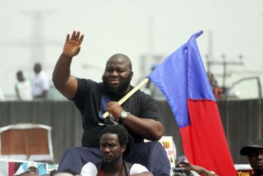 Asari Dokubo, leader of the Niger Delta People Volunteers Force, waves during a march in support of Nigeria&#039;s President Goodluck Jonathan on fuel subsidies removal in the oil hub city of Port Hacourt