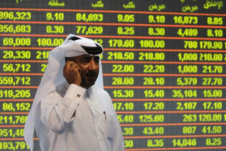 An investor monitors stock market activities at the Doha securities market