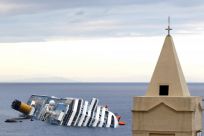 The Costa Concordia cruise ship is seen after it ran aground off the west coast of Italy, at Giglio island