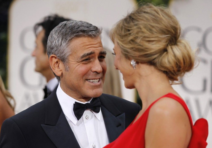 Actor George Clooney from the film &quot;The Descendants&quot; and &quot;The Ides of March&quot; and girlfriend Stacy Keibler arrive at the 69th annual Golden Globe Awards in Beverly Hills
