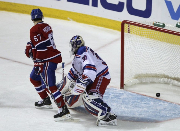 Canadiens Pacioretty scores on Rangers goalie Lundqvist during second period NHL hockey action in Montreal