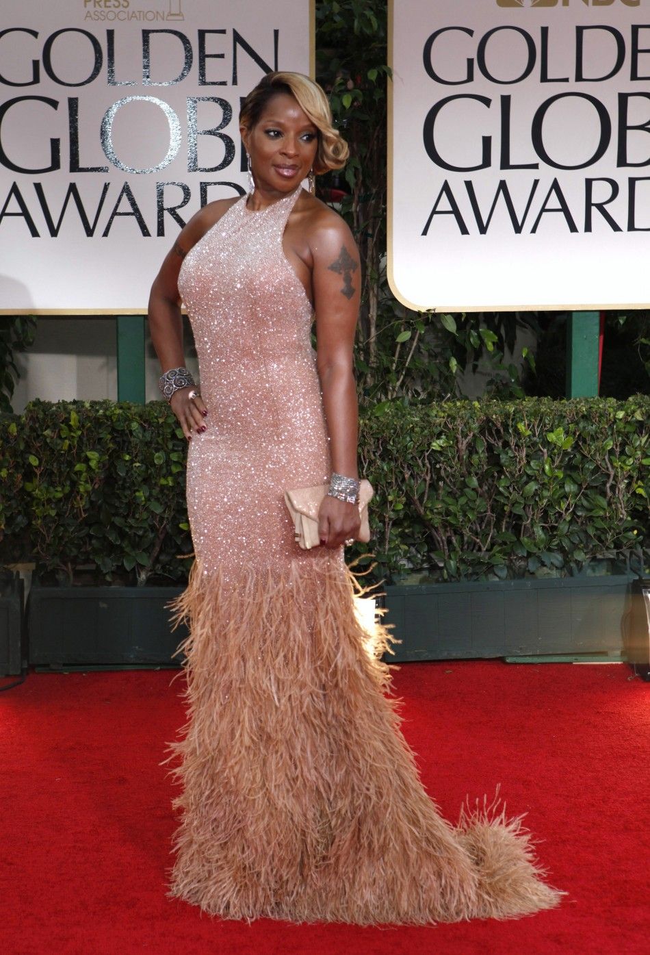 Singer Mary J. Blige poses as she arrives at the 69th annual Golden Globe Awards in Beverly Hills, California January 15, 2012. 
