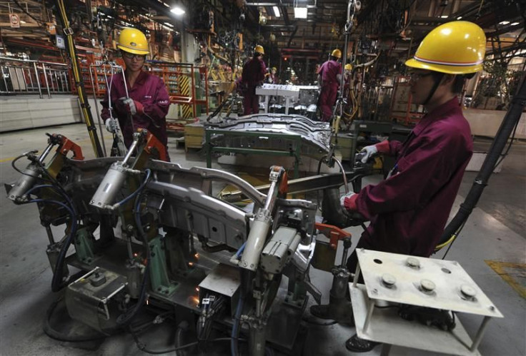 Employees weld automobiles at Anhui Jianghuai Automobile Co. Ltd (JAC Motors) in Hefei