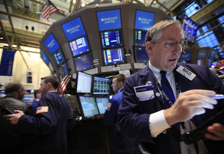 Traders work on the floor of the New York Stock Exchange