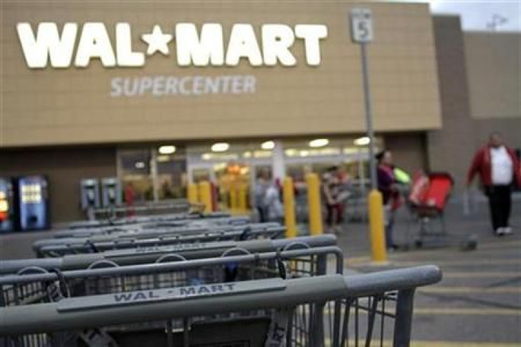 Shopping carts are seen outside a Wal-Mart Supercenter in Coolidge