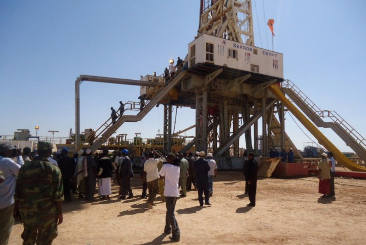 Engineers and visitors explore an exploratory well near Dharoor town in Puntland