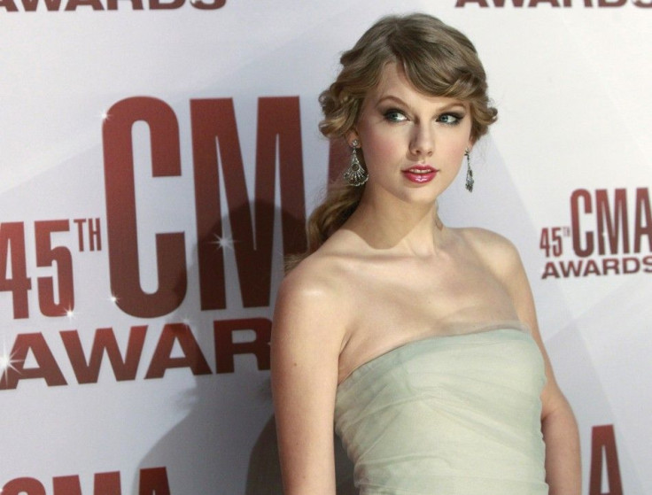 Taylor Swift "Eyes Open" for Hunger Games