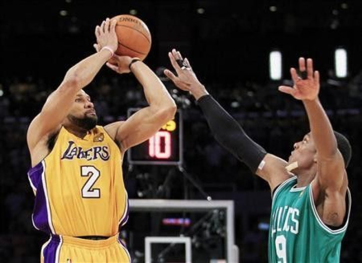 Los Angeles Lakers' Derek Fisher shoots over Boston Celtics' Rajon Rondo during the fourth quarter in Game 7 of the 2010 NBA Finals series in Los Angeles, California