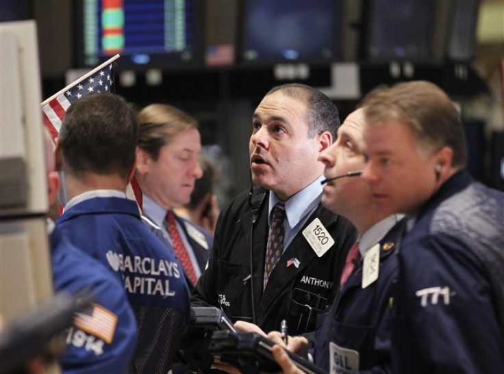 Traders work on the floor of the New York Stock Exchange