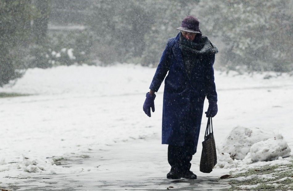 Residents Bundle Up Against Snow Storm 