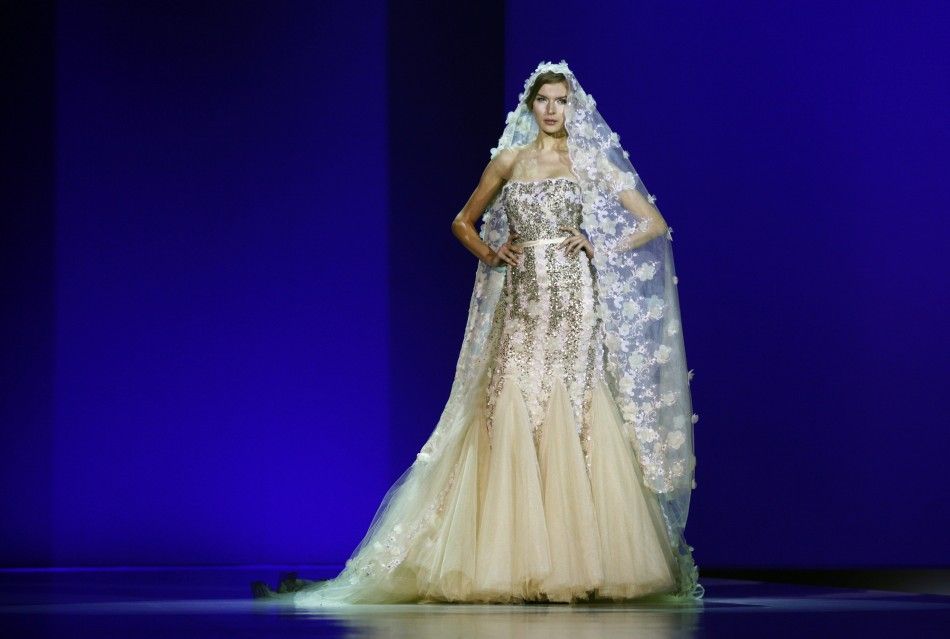 A model presents a creation from Modessa Couture during its 039Shimmering Reflectionzs039 show on the second day of Hong Kong Fashion Week FallWinter January 17, 2012. Hong Kong Fashion Week, which lasts till January 19, features about 1,900 exhibi