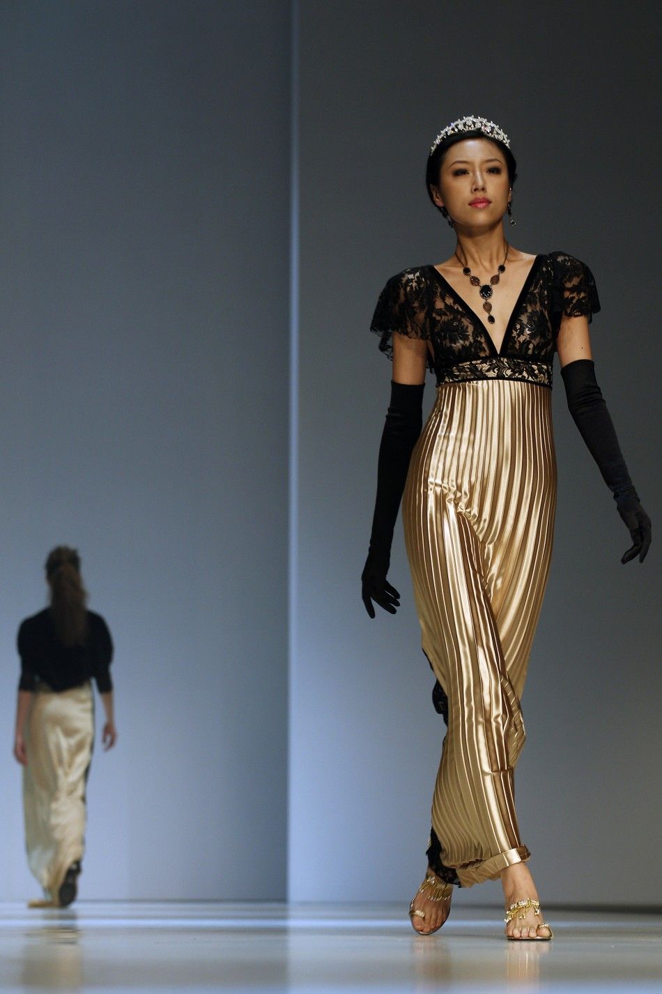 A model presents a creation from the brand Mondovi by designer Do Do Leung of Hong Kong as part of her FallWinter 2012 fashion show during Hong Kong Fashion Week January 16, 2012. Hong Kong Fashion Week, which lasts till January 19, features about 1,900 