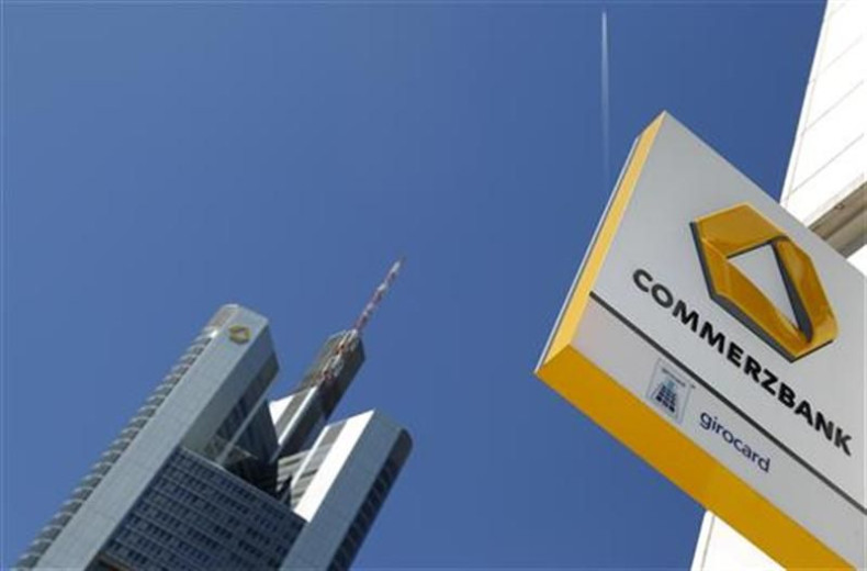 A logo of Germany's Commerzbank is seen in bright sunshine next to the headquarters of the bank in Frankfurt
