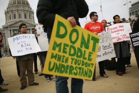 Anti-piracy legislation protesters gather to demonstrate against the SOPA being considered by Congress, at City Hall in San Francisco