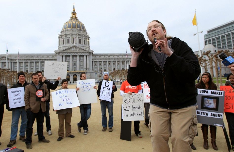 Internet activist Nelson speaks during a protest of the SOPA legislation being considered by Congress, at City Hall in San Francisco
