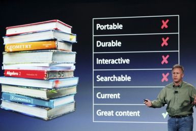 Apple Marketing chief Phil Schiller speaks during a news conference introducing a digital textbook service in New York